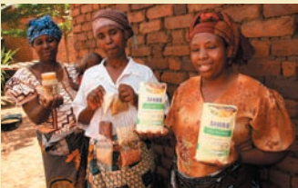 proud women showing products of their hands